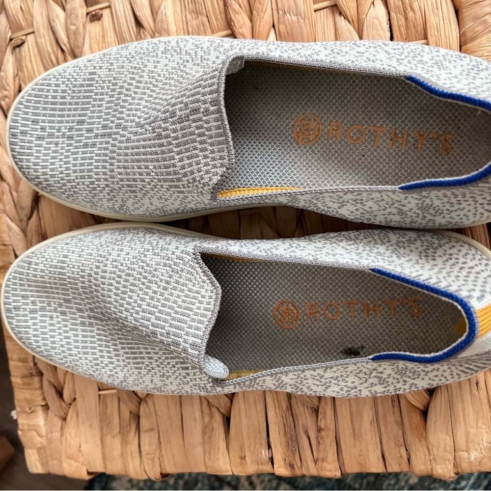 Women’s grey and white snake slip on sneakers